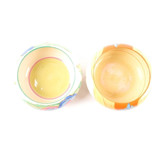234 - Two Clarice Cliff pottery bowls, 'Windbells' and 'Autumn' pattern variation, inverted rims. Printed ... 