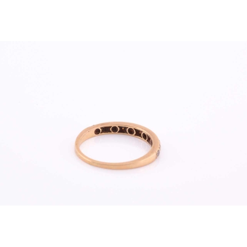 100A - An 18ct yellow gold band ring, pave-set with small round-cut diamonds, size O, 2 grams.