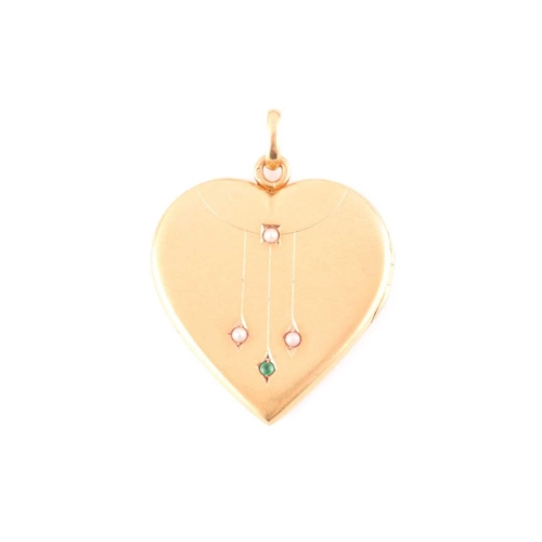 102 - An early 20th century yellow metal heart-shaped locket pendant, the hinged front inset with small se... 