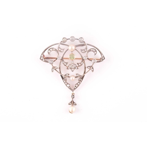 103 - A yellow and white metal, peridot, diamond and pearl brooch/pendant, the openwork art Nouveau style ... 
