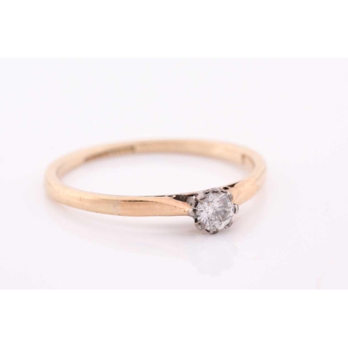 107 - A single stone synhetic corundum dress ring; the circular cut stone in six claw setting and heart-sh... 
