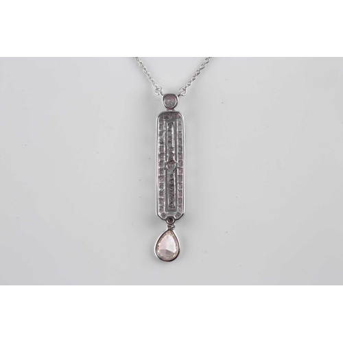 108 - An 18ct white gold and diamond drop pendant, in the Art Deco style, set with a mixed pear-cut diamon... 