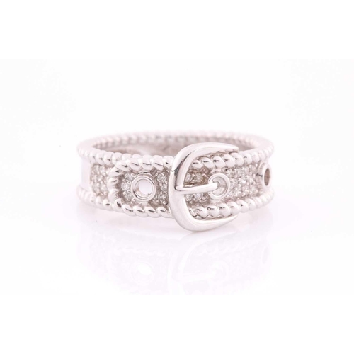 109 - An 18ct white gold and diamond buckle ring, the mount pave-set with round brilliant-cut diamond acce... 