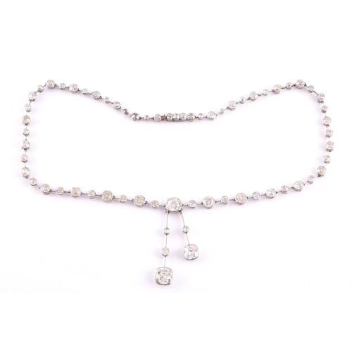 110 - An impressive antique collet-set diamond lavliere necklace, suspended with two old mine cut diamonds... 