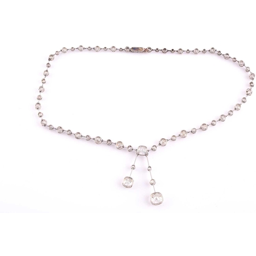 110 - An impressive antique collet-set diamond lavliere necklace, suspended with two old mine cut diamonds... 