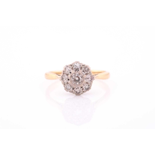 118 - An 18ct yellow gold and diamond cluster ring, set with round eight-cut diamonds, the central stone a... 