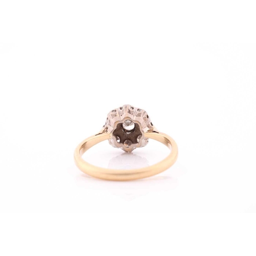 118 - An 18ct yellow gold and diamond cluster ring, set with round eight-cut diamonds, the central stone a... 