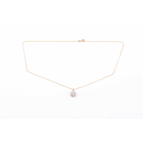 299 - An 18ct yellow gold and diamond cluster pendant, set with round brilliant-cut diamonds, pendant appr... 