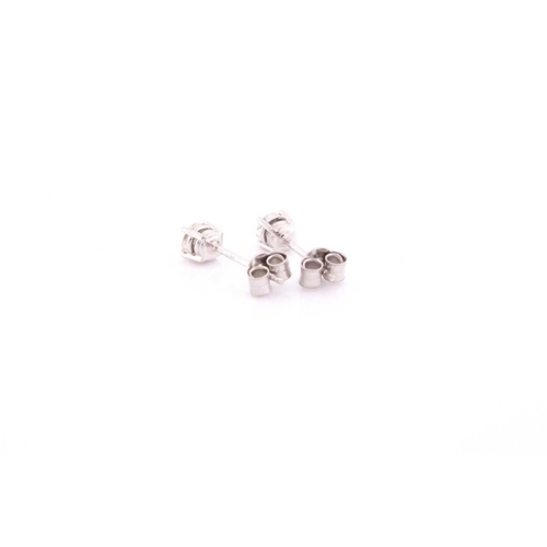 300 - A pair of platinum and diamond earrings, the round brilliant-cut diamonds of approximately 0.56 cara... 