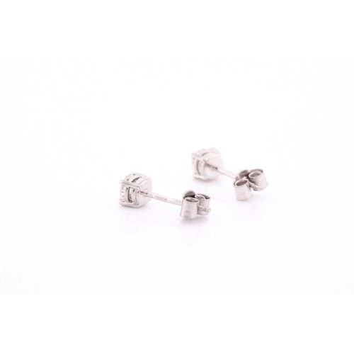 300 - A pair of platinum and diamond earrings, the round brilliant-cut diamonds of approximately 0.56 cara... 