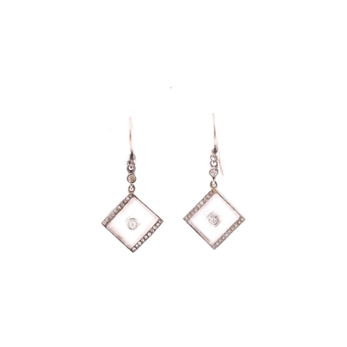 301 - A pair of early 20th century diamond and rock crystal drop earrings, the squared mounts with frosted... 