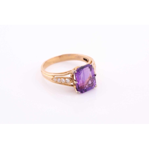 305 - A yellow metal, diamond, and amethyst ring, set with an emerald-cut amethyst, measuring approximatel... 