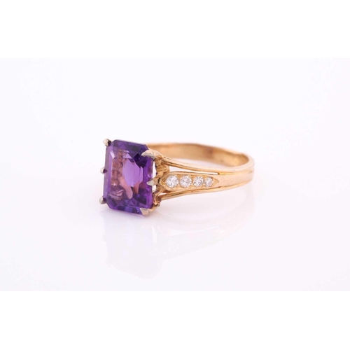 305 - A yellow metal, diamond, and amethyst ring, set with an emerald-cut amethyst, measuring approximatel... 