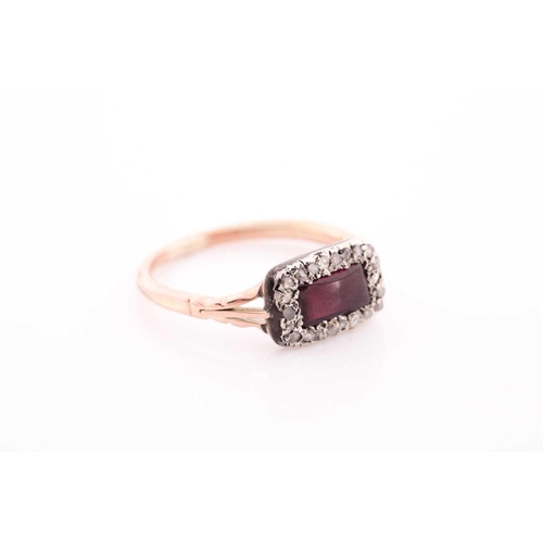 308 - An early to mid 19th century yellow metal, diamond, and pink stone ring, set with a rectangular smoo... 