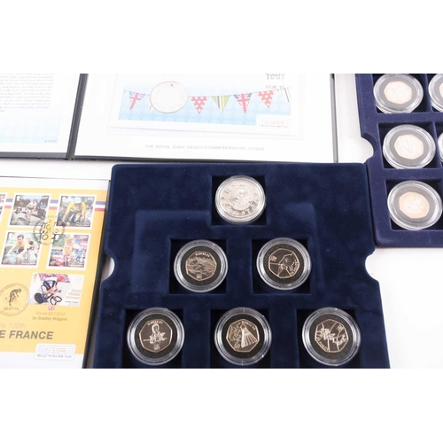 317 - Seven boxed commemorative coin sets, comprising: 1953 Coronation Sixpence in gold-plated diamond pen... 