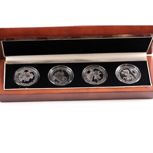 318 - Eight boxed sets of commemorative coins, comprising: 'Squadrons of the Royal Air Force' four-coin se... 