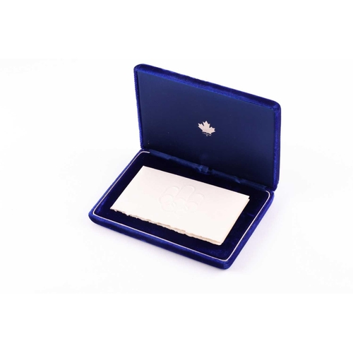 324 - A cased set of three silver ingots, designed as stamps, in honour of the 1976 Summer Olympics, relea... 