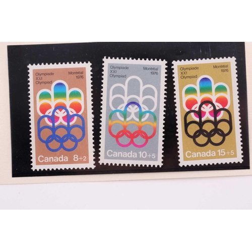 324 - A cased set of three silver ingots, designed as stamps, in honour of the 1976 Summer Olympics, relea... 