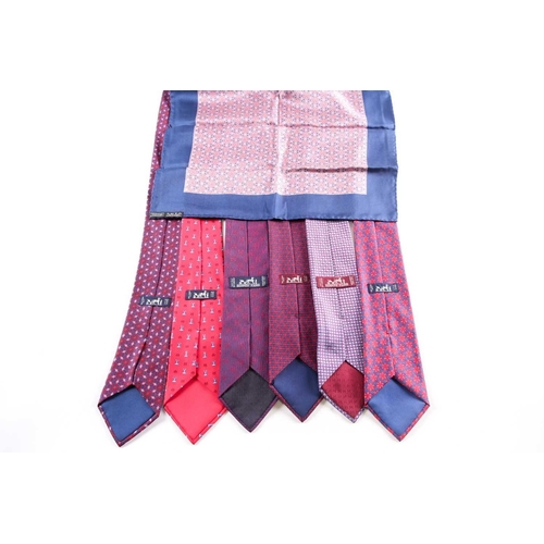 326 - A group of seven Hermes silk ties, various designs, and a silk hankerchief.