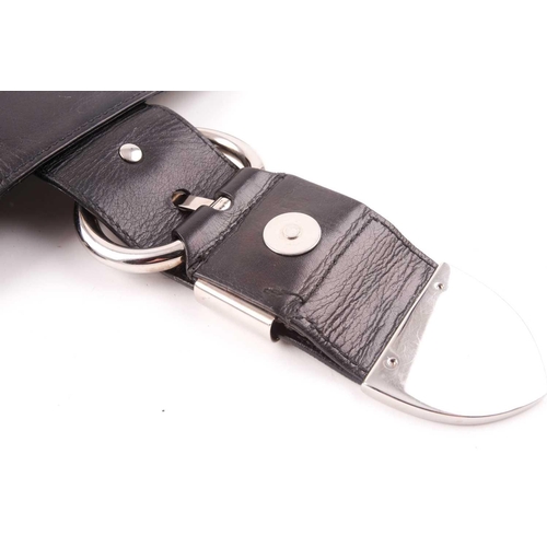 327 - Gucci. A black leather handbag, with chrome fittings and wide shoulder strap, paisley material lied ... 