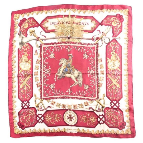 331 - Hermes, Paris. A polychrome zodiac scarf, with dark blue border, together with a Hermes scarf with t... 