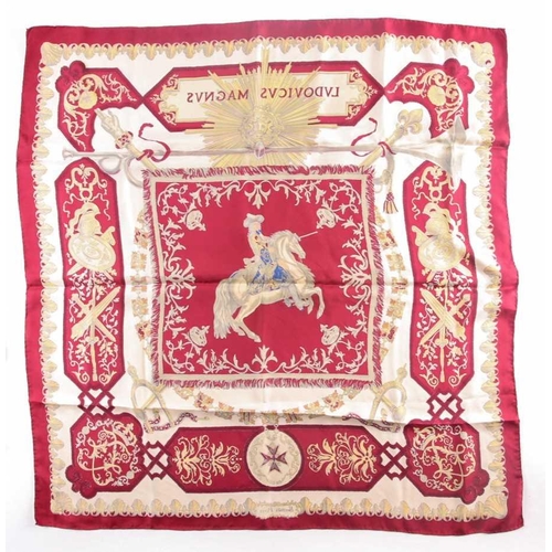 331 - Hermes, Paris. A polychrome zodiac scarf, with dark blue border, together with a Hermes scarf with t... 