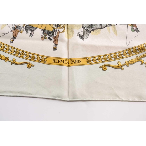333 - A Hermes silk square scarf printed with La Promenade De Longchamps pattern in yellow and tones of pa... 