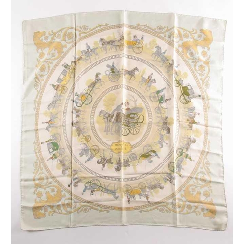 333 - A Hermes silk square scarf printed with La Promenade De Longchamps pattern in yellow and tones of pa... 