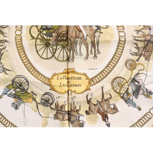 333 - A Hermes silk square scarf printed with La Promenade De Longchamps pattern in yellow and tones of pa... 