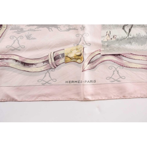 338 - A Hermes silk square scarf printed with coaching scenes on a pink ground, together with another 