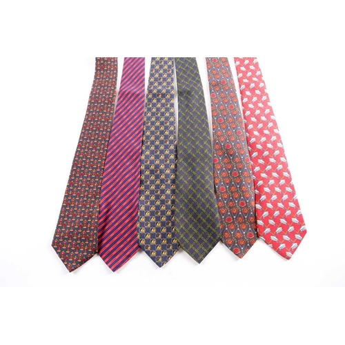 339 - A group of seven Chanel ties, in various designs and colours. (7)