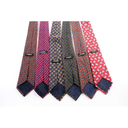 339 - A group of seven Chanel ties, in various designs and colours. (7)