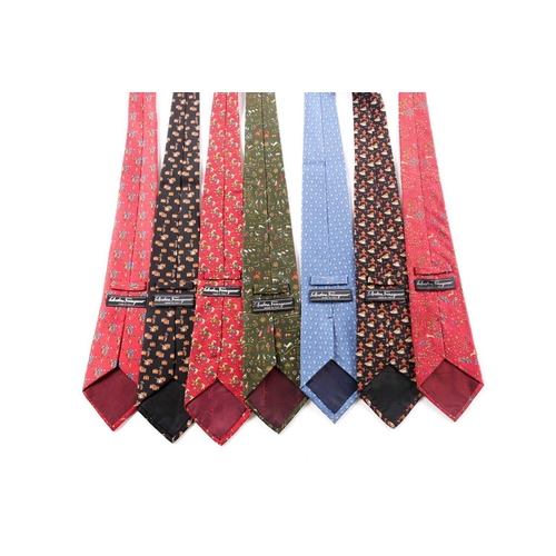 341 - A group of seven Ferrogamo silk ties, various designs, in blue, red, green, and black silk. (7)