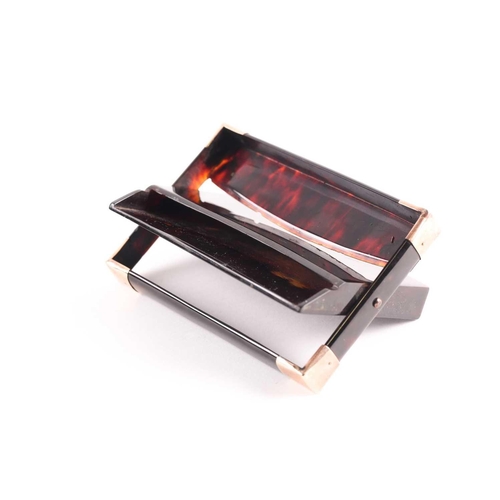 343 - An early 20th century rose gold mounted tortoiseshell card case; rectangular envelope style with hin... 