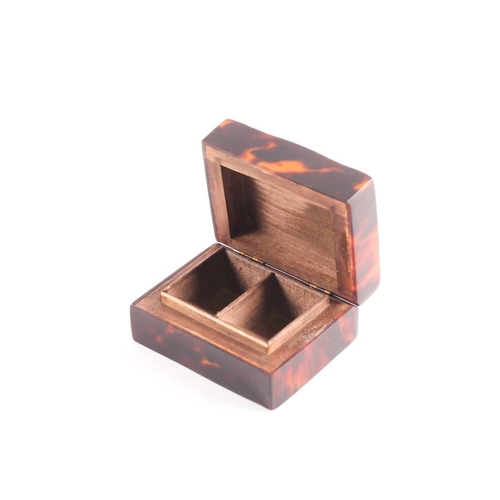 344 - An Edwardian silver and tortoiseshell stamp box, rounded rectangular, the hinged cover with applied ... 