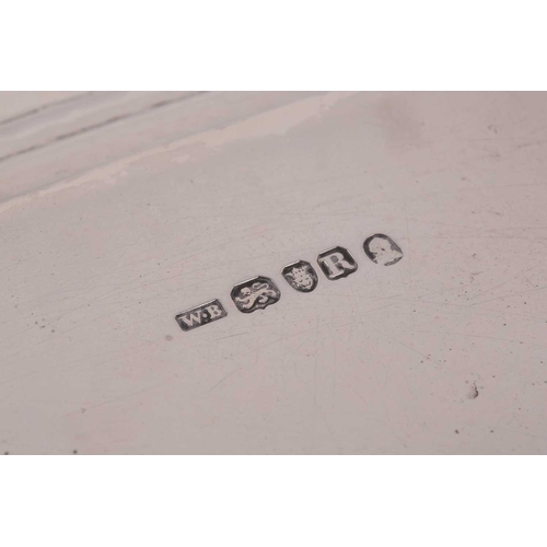 349 - A George III rectangular silver salver. London 1812 William Bennet, with raised gadrooned border on ... 