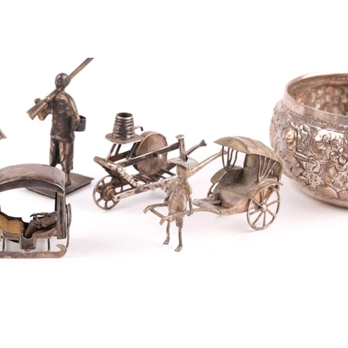 350 - A Continental novelty silver grinding wheel on barrow, and other novelty items in white metal and a ... 