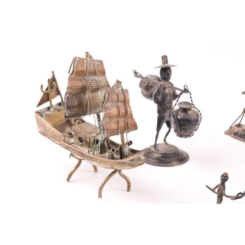 350 - A Continental novelty silver grinding wheel on barrow, and other novelty items in white metal and a ... 