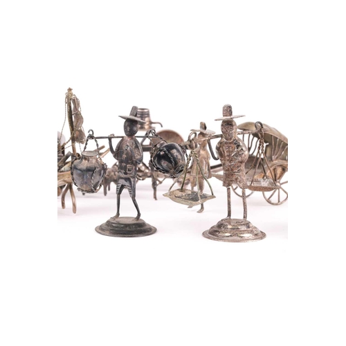 350 - A Continental novelty silver grinding wheel on barrow, and other novelty items in white metal and a ... 