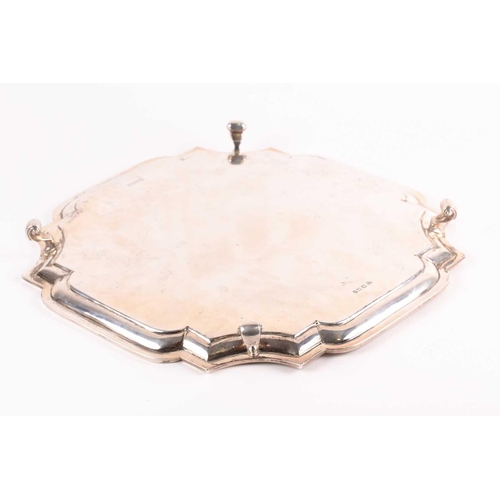 352 - A George V silver salver, London 1920 by Z Barraclough & Sons, of shaped, square form on four scroll... 
