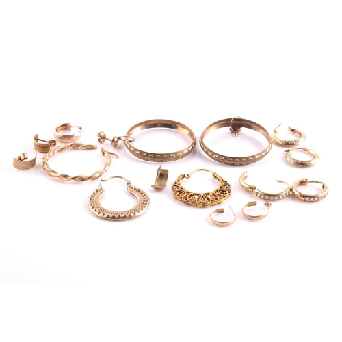 64 - A pair of 9ct yellow gold hoop earrings, together with a pair of 9ct yellow gold and white paste sto... 