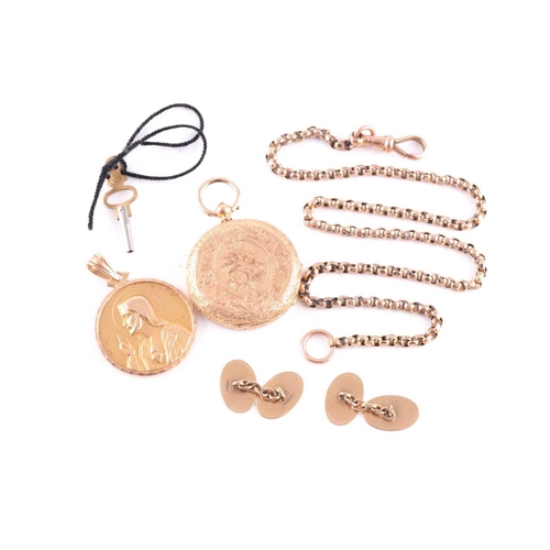 65 - A yellow metal pendant depicting the Virgin Mary with the Infant Jesus, depicting Jesus as an adult ... 