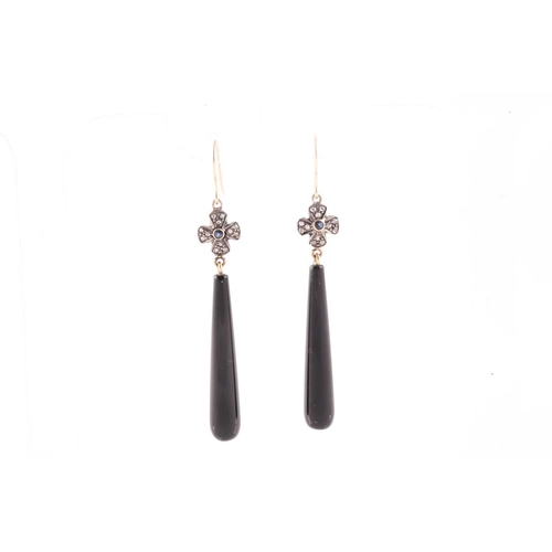 71 - A pair of diamond and onyx drop earrings, with tapered black onyx drops, beneath a diamond and sapph... 