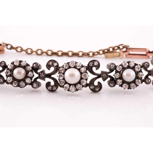 73 - A late 19th / early 20th century diamond bracelet, set with three clusters of old-cut diamonds centr... 