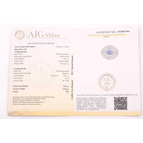 74 - A silver, diamond, and tanzanite ring, set east to west with a mixed oval-cut tanzanite of approxima... 