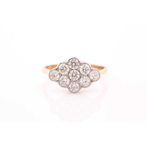 76 - An 18ct yellow gold and diamond ring, set with a cluster of nine round brilliant-cut diamonds of app... 
