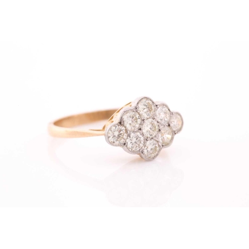 76 - An 18ct yellow gold and diamond ring, set with a cluster of nine round brilliant-cut diamonds of app... 