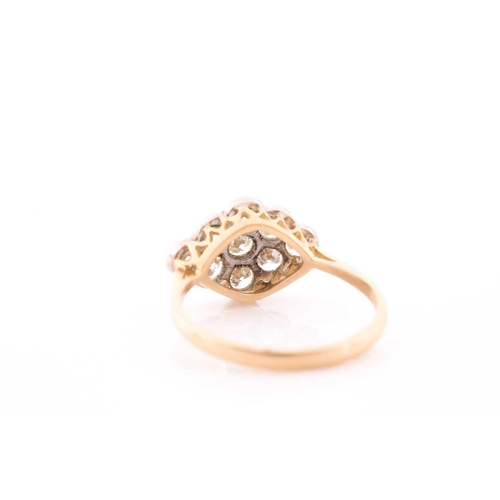 76 - An 18ct yellow gold and diamond ring, set with a cluster of nine round brilliant-cut diamonds of app... 