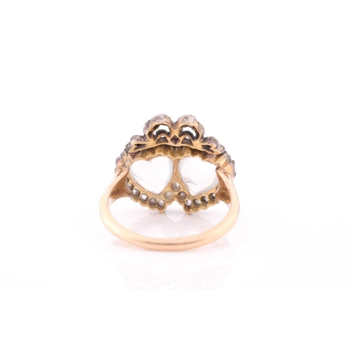 77 - An antique diamond and moonstone double heart ring, the mount set with heart-shaped cabochon moonsto... 