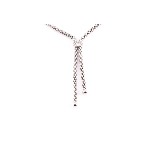 79 - Fope, Italy. An 18ct white gold chain necklace, the lavaliere style with two drops with rounded term... 